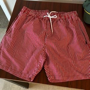 Men’s red and white swim suit size large
